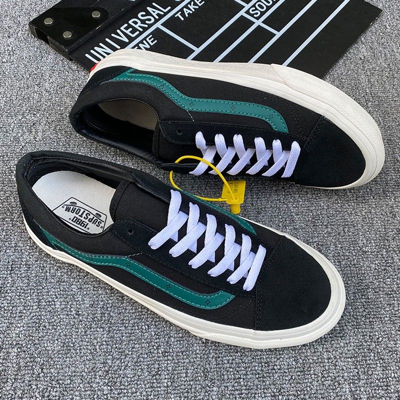Black shoes best sale with green stripes