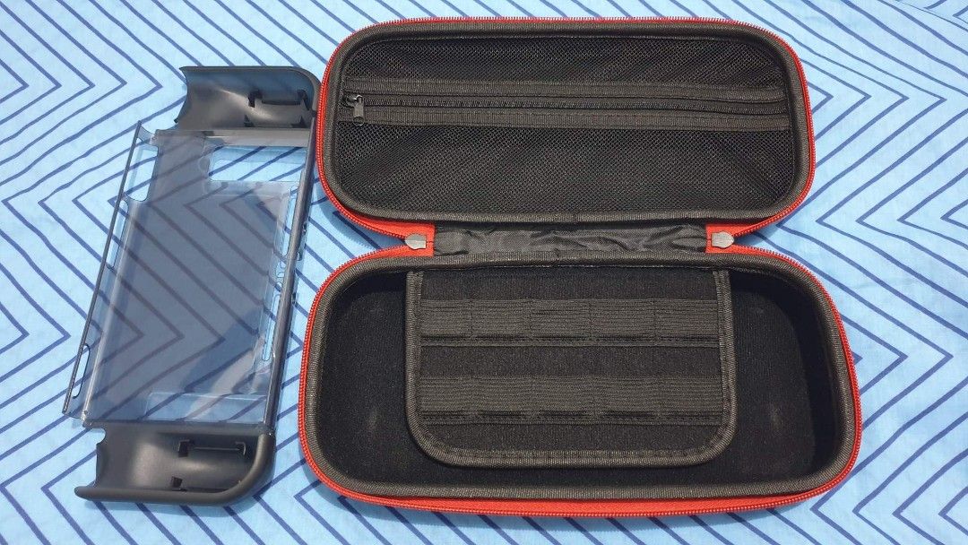Dobe Carrying Case with free black case for Switch v1/v2 (Category: Cases & Covers) located in Quezon City. Submitted by hrk_icebear03 (Listing ID 1206771073, Image 3). Description: MOP: Gcash, bank transfer Payment first policy, last price posted. Buyer will shoulder sf. MOD: J&T (next day shipping, weekdays only).