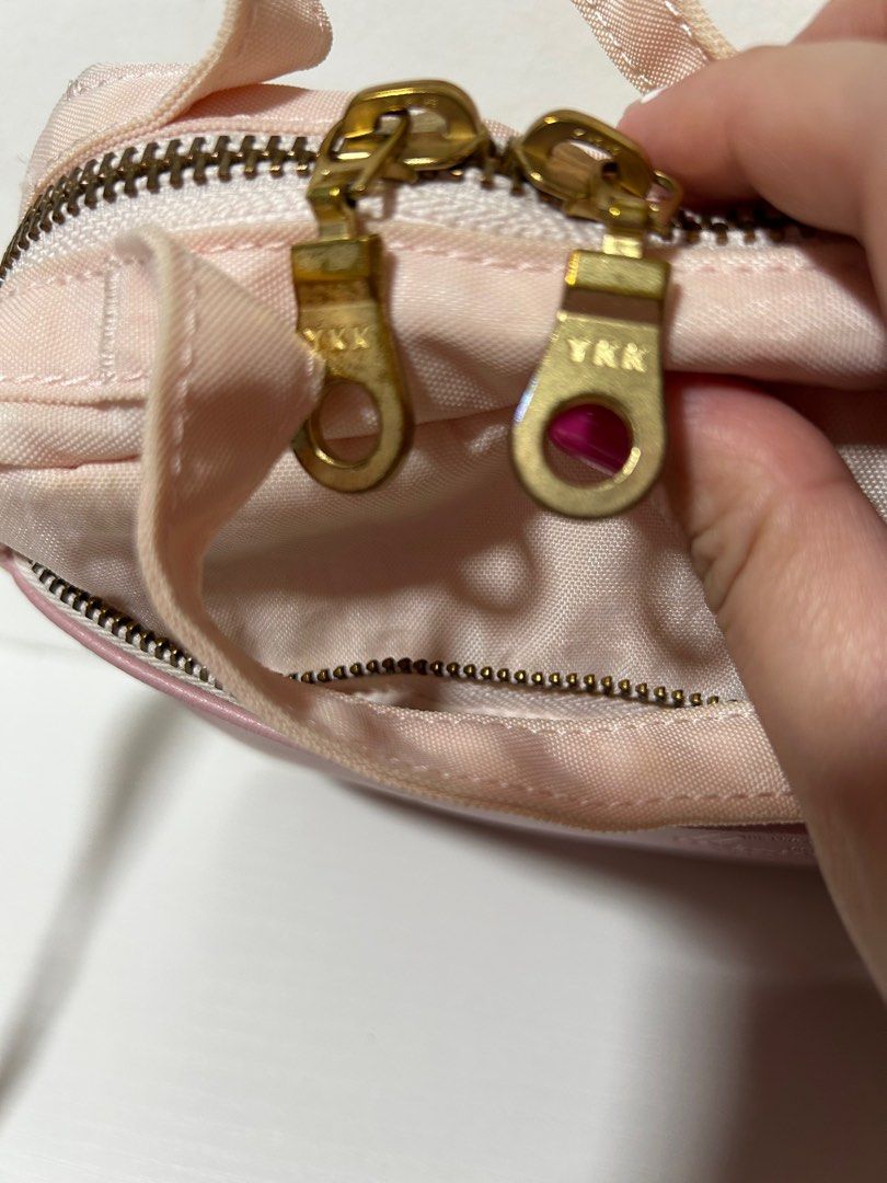 Herschel Orion Crossbody (Category: Cross-body Bags) located in Pasig City. Submitted by trisha_12 (Listing ID 1206713384, Image 3). Description: Herschel Orion Crossbody preloved rosewater pastel color 6.5” H x 9.5 “ W x 2.75” D in good condition adjustable strap dual top carrying handles front pocket volume: 3.5L.