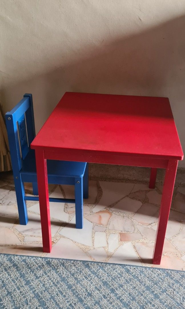 Ikea Kritter red table and blue chair. Lovingly used with some visible