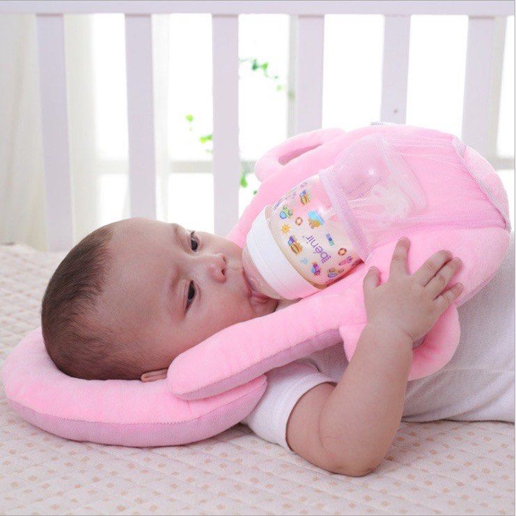 Baby bottle pillow shop holder