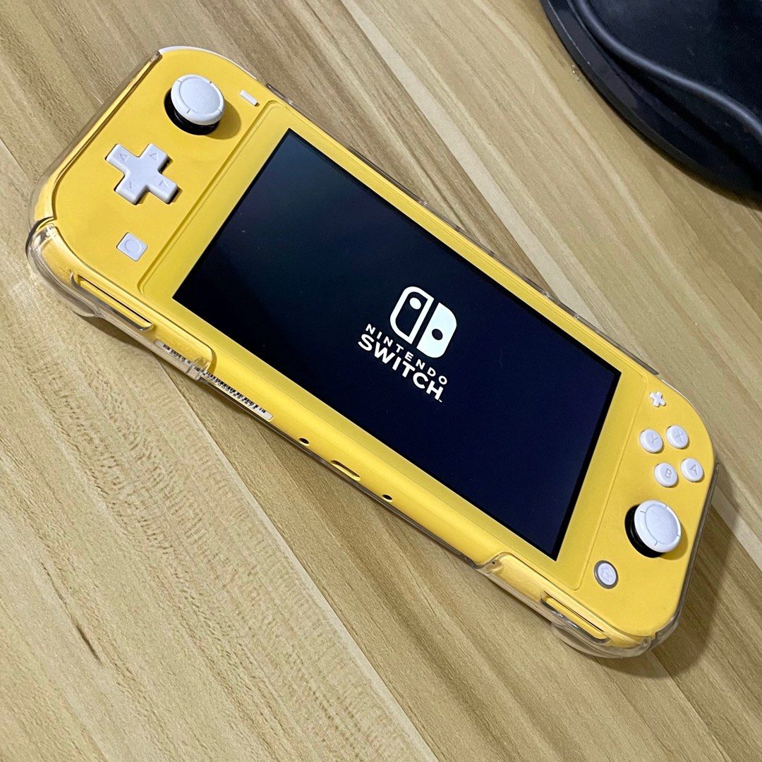 Nintendo Switch Lite (Yellow) - Complete Package with games (Category: Nintendo) located in Quezon City. Submitted by blueblink35 (Listing ID 1206914833, Image 2). Description: Unit Box Charger Gulikit protective case Screen protector SanDisk 64GB microSD Games: Animal Crossing New Horizons Mortal Kombat 11 Ultimate Gear-Club Unlimited Cook, Serve, Delicious! 2!! Jisei: The First Case HD Stay Drowning Arcade Archived Circus Charlie Pokemon Unite 