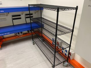4 tier rack shelving unit with roller