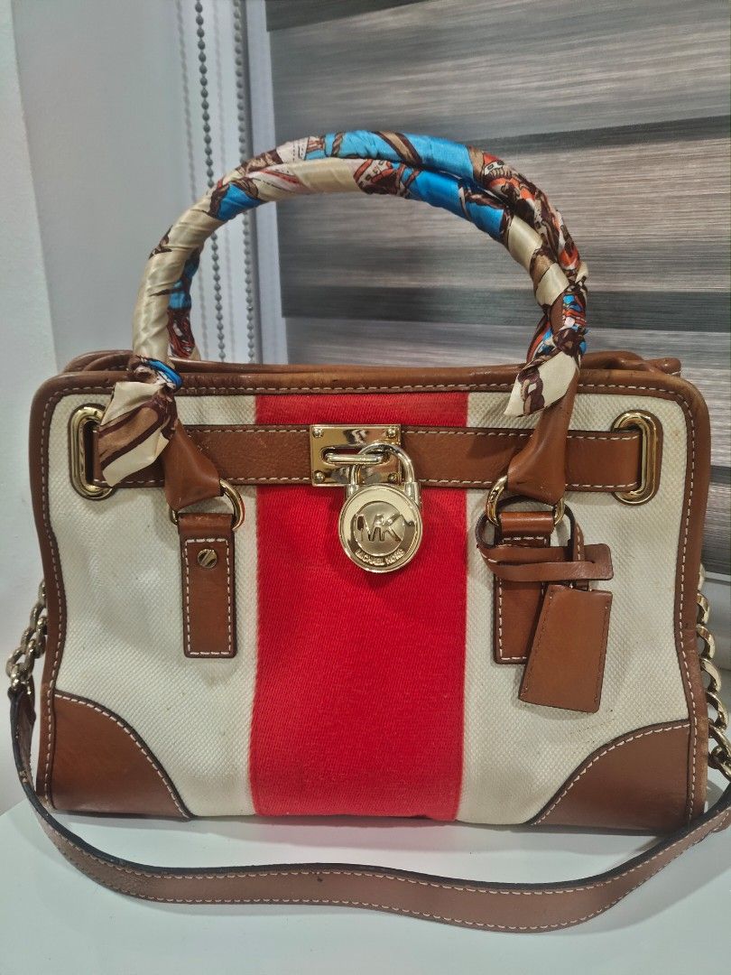 How to tell if a michael kors hamilton bag is real deals