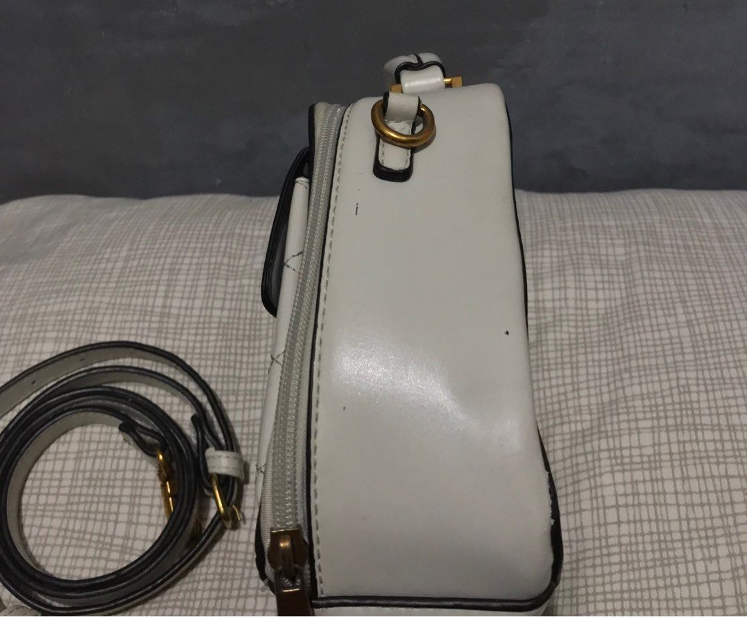 DUSTO Leather Sling Bag, Luxury, Bags & Wallets on Carousell