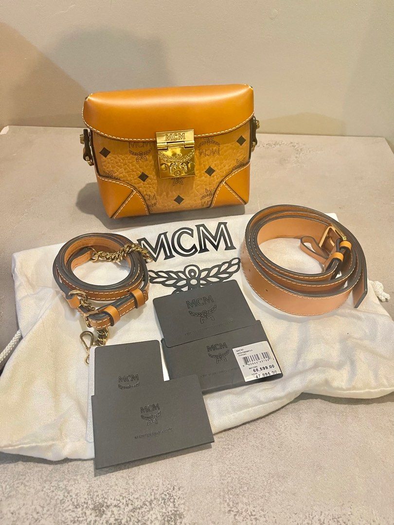 MCM beltbag sling bag Berlin Vesitos (Category: Luxury Bags & Wallets) located in Cainta. Submitted by closet83 (Listing ID 1208706538, Image 2). Description: 🔴PLEASE READ🔴 •Major decluttering •AUTHENTIC!!!! MCM Berlin Vesitos (Cognac) • Belt bag & Sling bag •HARD TO FIND • EXCELLENT CONDITION 9/10 • GOOD AS NEW •Locally purchased (see tag) •Used only once on a trip abroad •Comes with belt strap (40.5 inches) Adjustable Sling strap w/ chain (53
