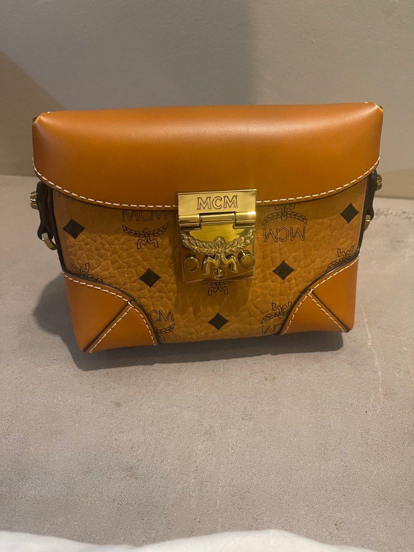 MCM beltbag sling bag Berlin Vesitos (Category: Luxury Bags & Wallets) located in Cainta. Submitted by closet83 (Listing ID 1208706538, Image 3). Description: 🔴PLEASE READ🔴 •Major decluttering •AUTHENTIC!!!! MCM Berlin Vesitos (Cognac) • Belt bag & Sling bag •HARD TO FIND • EXCELLENT CONDITION 9/10 • GOOD AS NEW •Locally purchased (see tag) •Used only once on a trip abroad •Comes with belt strap (40.5 inches) Adjustable Sling strap w/ chain (53