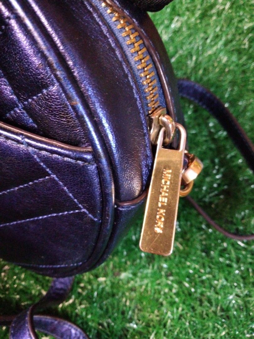 Michael kors round sling bag, Luxury, Bags & Wallets on Carousell