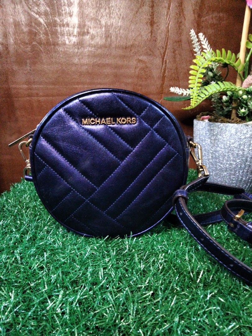 Michael kors round sling bag, Luxury, Bags & Wallets on Carousell