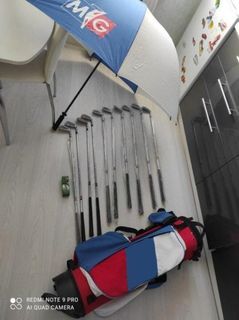 Set of golf clubs in a backpack