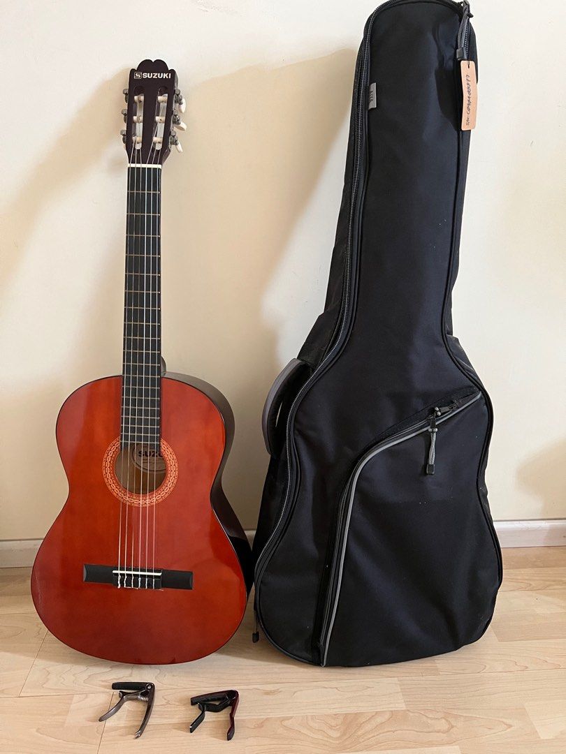 Suzuki classical guitar with half Nylon Strings, Hobbies & Toys, Music