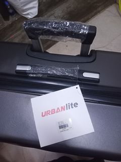Brand new UrbanLite Luggage. Large size, in Charcoal grey. In its original packaging, plastic on handles and price tag intact, included.