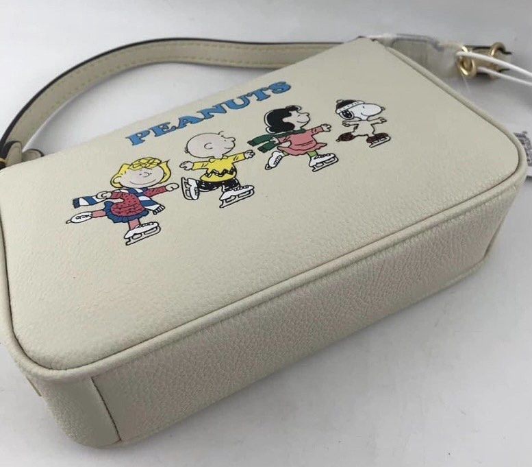Coach X peanuts nolita (Category: Luxury Bags & Wallets) located in Las Pinas. Submitted by yhn_boutique (Listing ID 1208987785, Image 2). Description: Actual pic posted Complete inclusions cod via lalamove J&T/ Lbc(cut off 2pm) Meet up las piñas area DM us for inquiries.