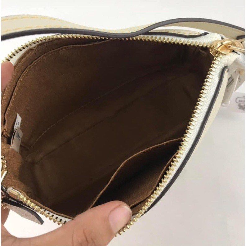 Coach X peanuts nolita (Category: Luxury Bags & Wallets) located in Las Pinas. Submitted by yhn_boutique (Listing ID 1208987785, Image 3). Description: Actual pic posted Complete inclusions cod via lalamove J&T/ Lbc(cut off 2pm) Meet up las piñas area DM us for inquiries.