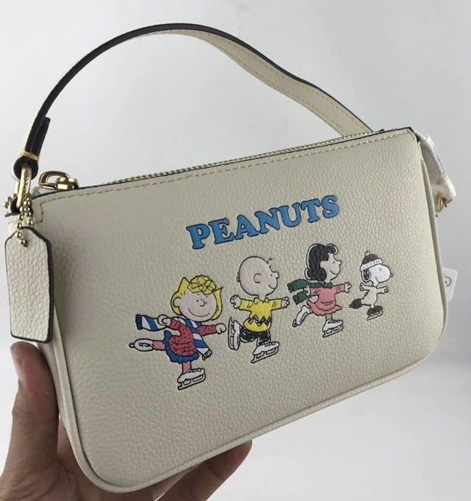 Coach X peanuts nolita (Category: Luxury Bags & Wallets) located in Las Pinas. Submitted by yhn_boutique (Listing ID 1208987785, Image 1). Description: Actual pic posted Complete inclusions cod via lalamove J&T/ Lbc(cut off 2pm) Meet up las piñas area DM us for inquiries.