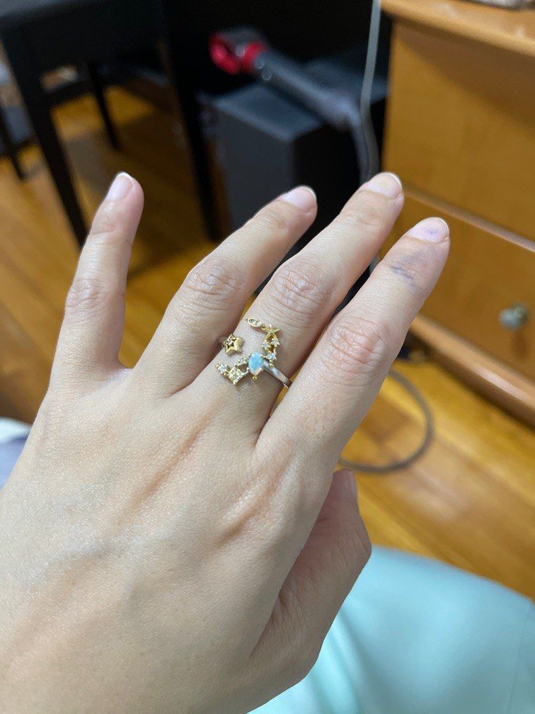 Opal ring (Category: Rings) located in Singapore. Submitted by swiftstar_e77a69 (Listing ID 1208994218, Image 1). Description: Small opal ring S925 silver, surface has yellow gold plated Adjustable band.