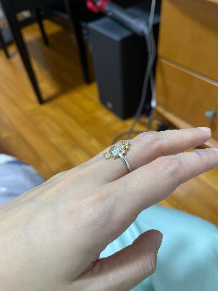 Opal ring (Category: Rings) located in Singapore. Submitted by swiftstar_e77a69 (Listing ID 1208994218, Image 2). Description: Small opal ring S925 silver, surface has yellow gold plated Adjustable band.