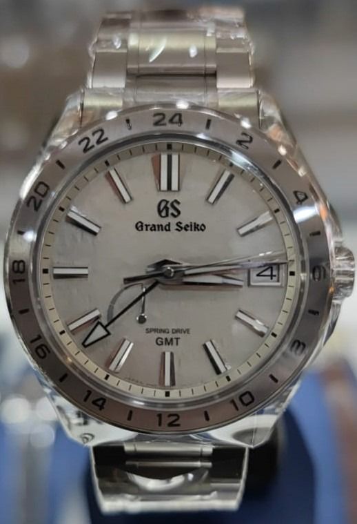 OwnOne : Grand Seiko SBGE285 Evolution 9 Mistflake GMT Spring Drive  Titanium, Men's Fashion, Watches & Accessories, Watches on Carousell