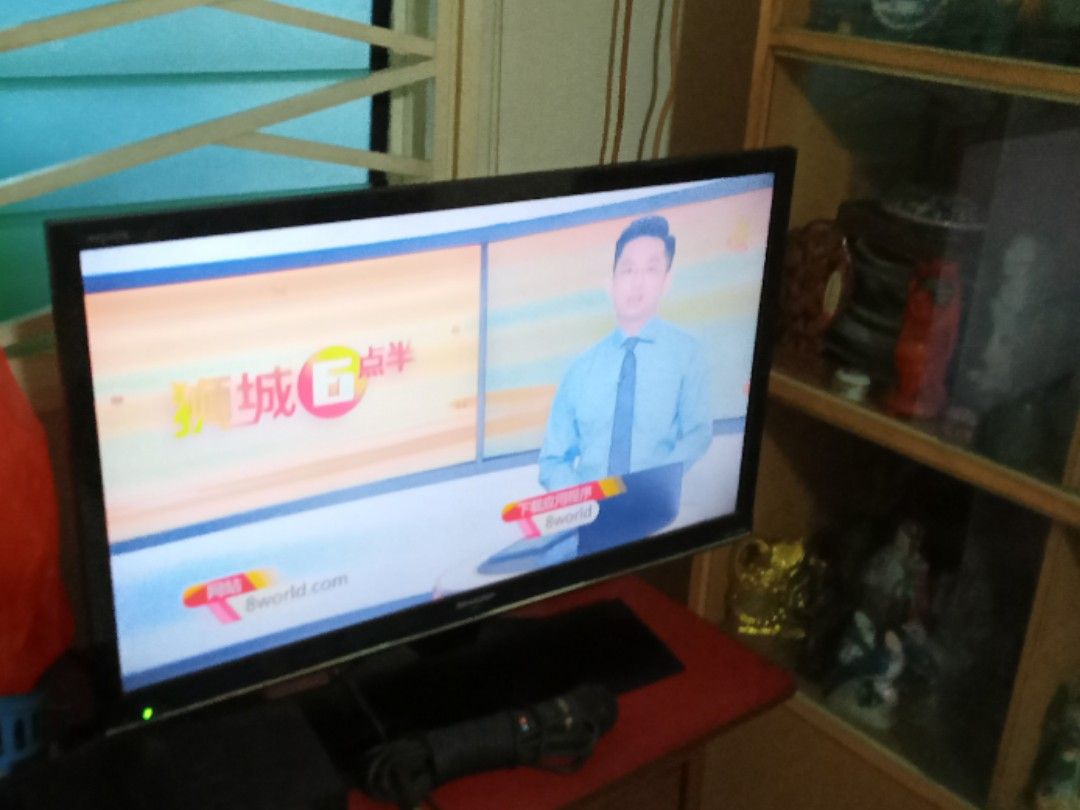 Sharp TV (Category: TV) located in Singapore. Submitted by bubblingspringpt (Listing ID 1208933555, Image 3). Description: Flaw, if any, are barely noticeable. Got some purple lines, sometimes. But I seldom see it..