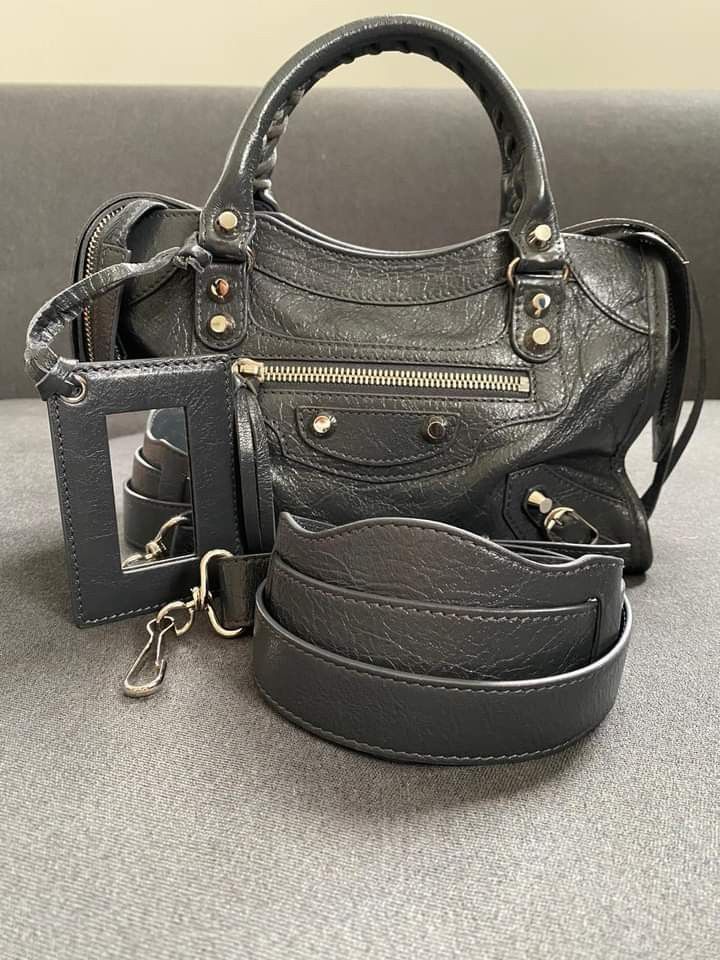 Balenciaga Mini City Bag (Category: Luxury Bags & Wallets) located in Manila. Submitted by bagislifeshop (Listing ID 1209246280, Image 1). Description: ▪️Balenciaga Mini City Bag▪️ ☑️Available in Pampanga ✅Condition: 8.5/10 ✅Material: lambskin ✅Color: anthracite in shw ✅Inclusions: replacement dustbag and long strap.