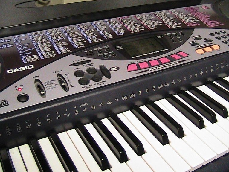 Electronic Keyboard CASIO LK50 Key Lighting System with 100 Song Banks