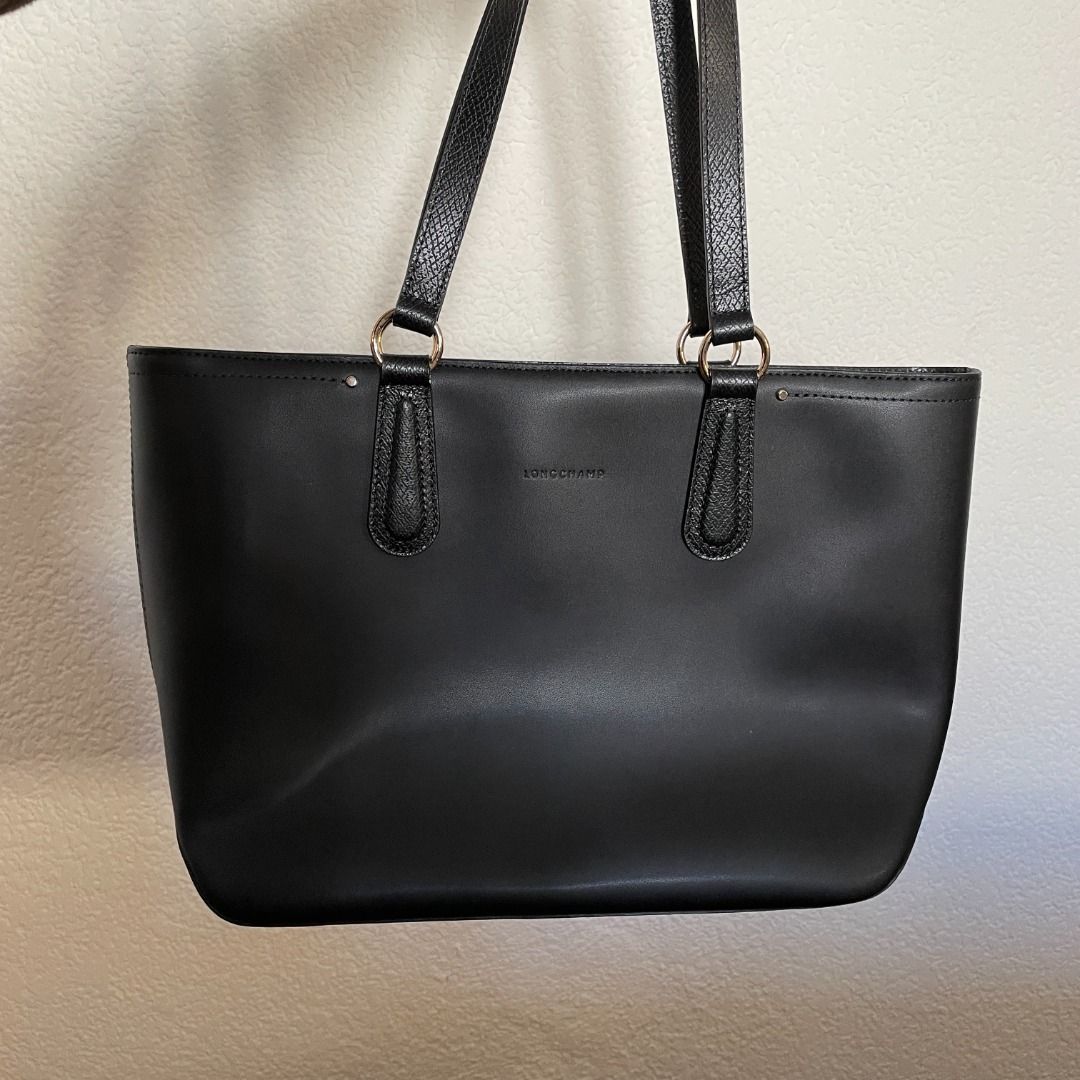 Longchamp Calvacade Leather Zip Top Shoulder Bag (Category: Tote Bags) located in Manila. Submitted by d_clutter_ (Listing ID 1209176790, Image 3). Description: Sale price for this one! Comes with paper bag, sack pouch, and receipt. Original price is P24,000+. 💓 ETA: Feb 21, 2023 More details about the bag here: https://www.johnlewis.com/longchamp-calvacade-leather-zip-top-shoulder-bag/p5283561.