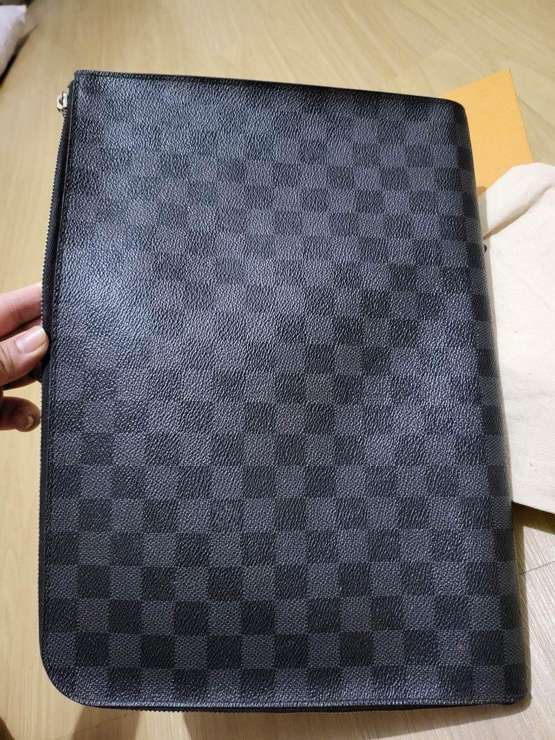 LV Clutch/laptop bag (Category: Clutches) located in Angeles City. Submitted by 3JSale (Listing ID 1209233836, Image 3). Description: Lv Damier Graphite clutch_ laptop bag for sale Bought at Solaire Ranked A dust bag + box Originally bought at 40k plus.