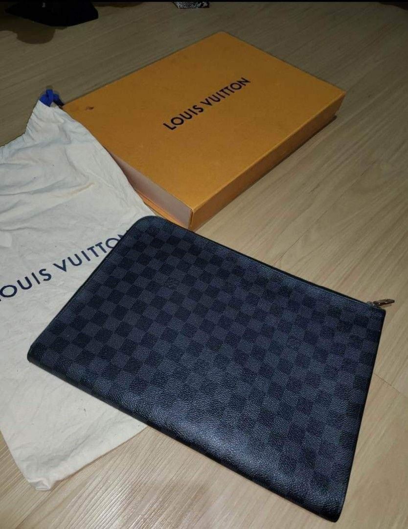 LV Clutch/laptop bag (Category: Clutches) located in Angeles City. Submitted by 3JSale (Listing ID 1209233836, Image 2). Description: Lv Damier Graphite clutch_ laptop bag for sale Bought at Solaire Ranked A dust bag + box Originally bought at 40k plus.