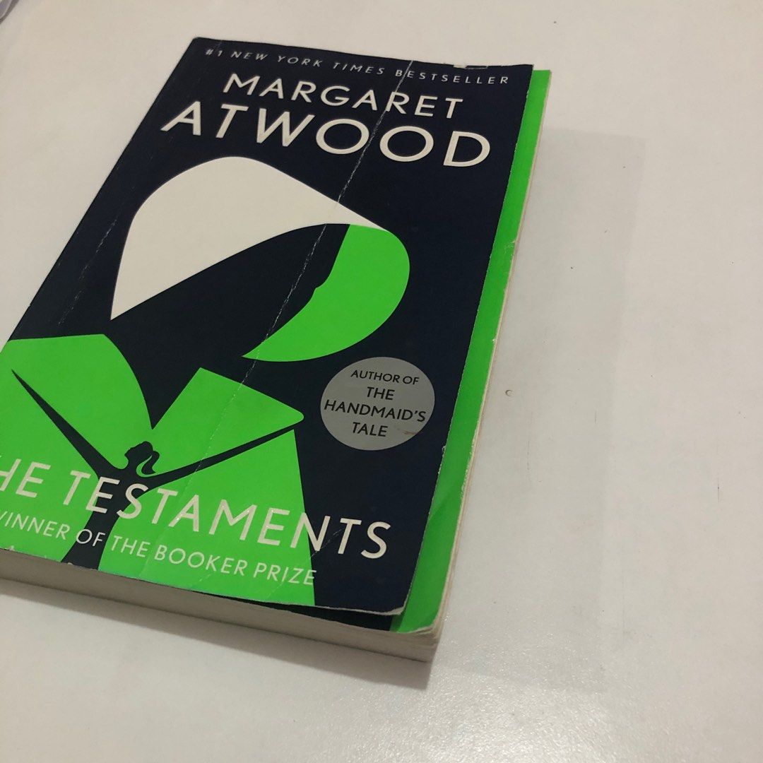Margaret Atwood: The Testaments (Category: Storybooks) located in Paranaque City. Submitted by daechwi7a (Listing ID 1209157131, Image 2). Description: Sequel to The Handmaid's Tale. See photos for very obvious flaws! No highlights/notes written on the pages and defects are only those seen in the pics and indicated here. A small section of the book had its pages soaked then dried. You can see this on the 6th photo where the pages are wavy. MOP: G