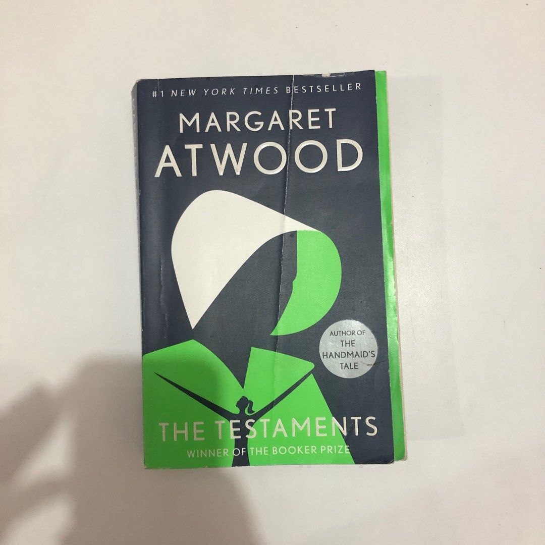 Margaret Atwood: The Testaments (Category: Storybooks) located in Paranaque City. Submitted by daechwi7a (Listing ID 1209157131, Image 1). Description: Sequel to The Handmaid's Tale. See photos for very obvious flaws! No highlights/notes written on the pages and defects are only those seen in the pics and indicated here. A small section of the book had its pages soaked then dried. You can see this on the 6th photo where the pages are wavy. MOP: G
