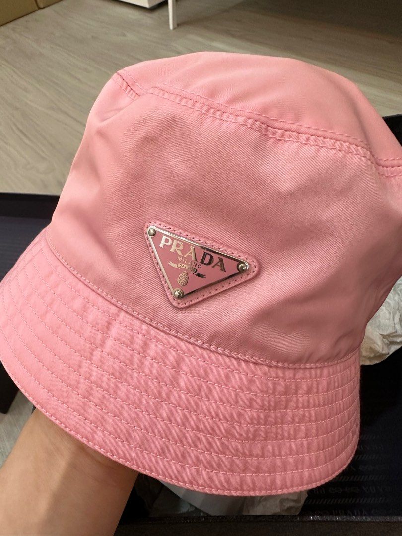 Prada Re-nylon bucket hat, Men's Fashion, Watches & Accessories, Caps & Hats  on Carousell