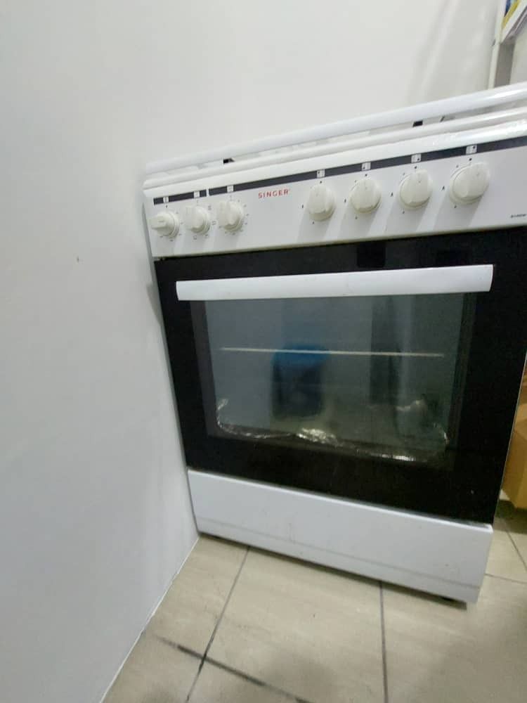 Singer built shop in oven