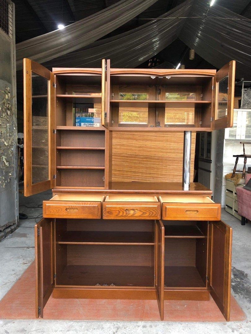 Wooden kitchen divider island board cabinet 47L x 18to32W x 69H inches Reversible Solid wood Glass doors Folding bar table 3 pullout drawers Adjustable shelves In good condition Code Ldmd s712 (Category: Shelves, Cabinets & Racks) located in Makati City. Submitted by FurnitureGallery (Listing ID 1209178311, Image 3). Description: Wooden kitchen divider island board cabinet 47L x 18to32W x 69H inches Reversible Solid wood Glass doors Folding bar t