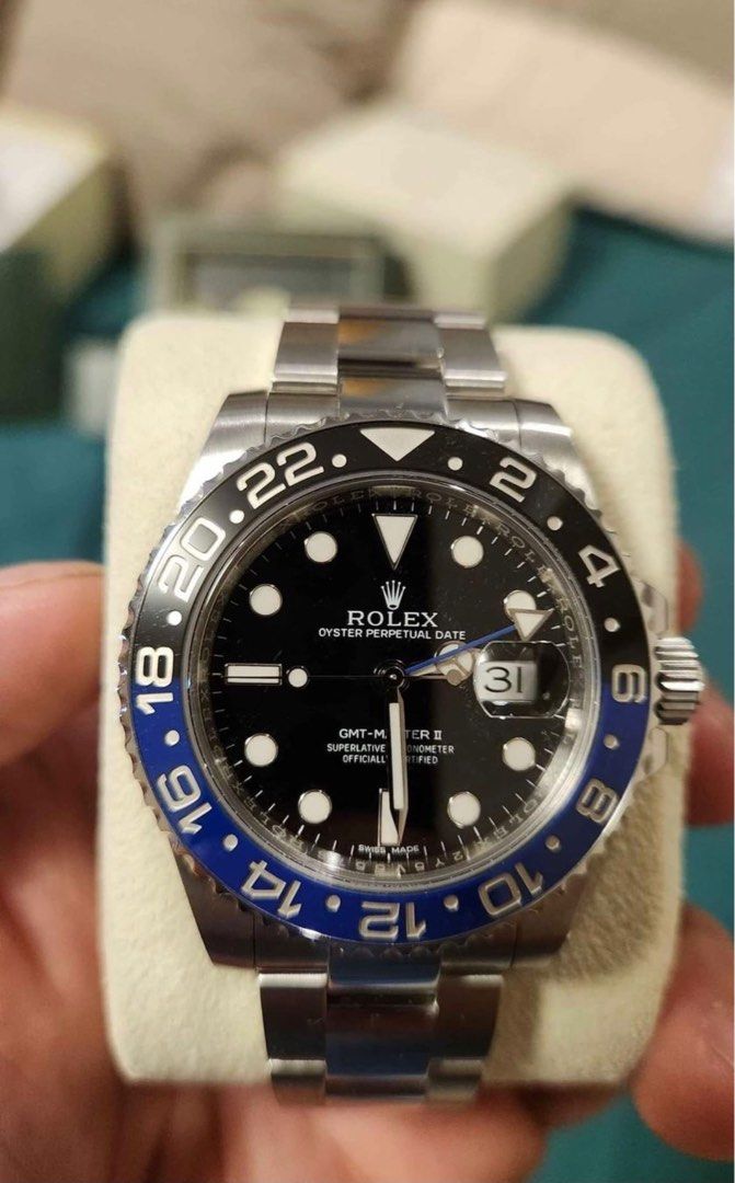 2022 Rolex GMT - Master II "Batman" (Category: Luxury Watches) located in Pasig City. Submitted by Watchaholics (Listing ID 1209297122, Image 1). Description: 2022 Rolex GMT - Master II "Batman" • Ref. 126710BLNR • 40mm, Oystersteel • Monobloc Middle Case, Screw - Down Case Back and Winding Crown • Waterproof to 100 Metres / 330 Feet • Bidirectional Rotatable 24 - Hour Graduated Bezel. Two - Colour Blue and Black Cerachrom Insert in Ceramic, Moul