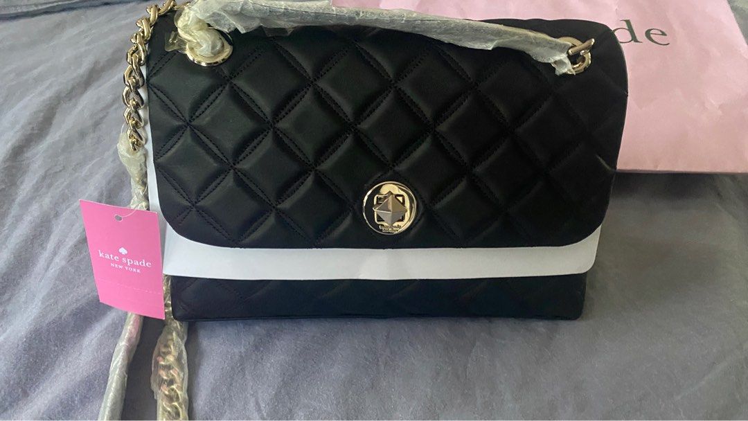 Kate spade black shoulder bag (Category: Luxury Bags & Wallets) located in Quezon City. Submitted by dealhunter78 (Listing ID 1209257845, Image 1). Description: .