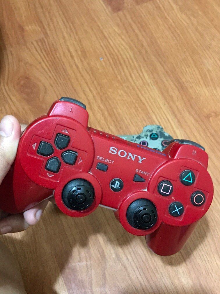 PlayStation controllers (red and camouflage), Video Gaming, Gaming