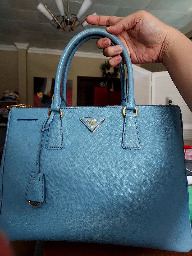 Prada Saffiano Galleria (Category: Luxury Bags & Wallets) located in Paranaque City. Submitted by andim8 (Listing ID 1209269510, Image 1). Description: Prada Saffiano Galleria with original dustbag and cards excellent preloved condition. shoulder strap wala na but theres provisions for straps #topitems.