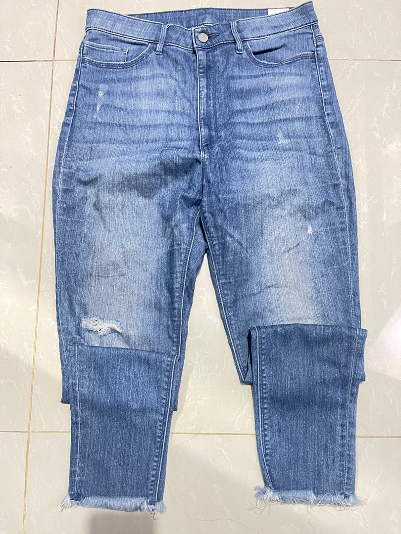Ripped jeans by uniqlo, Fesyen Wanita, Pakaian Wanita, Bawahan di Carousell