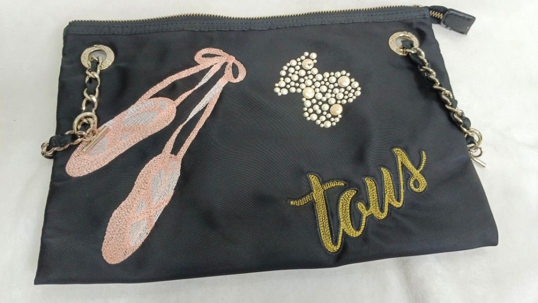 Tous pouch hotsell