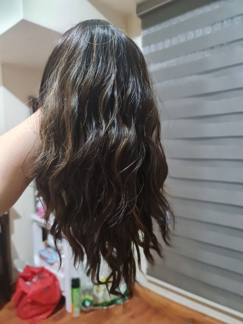 Wig (human hair quality) (Category: Hair Accessories) located in Pasig City. Submitted by 53888 (Listing ID 1209382058, Image 2). Description: brand new with tag and packaging brand:Entranced Styles shoulder length wavy brown with blonde highlights.