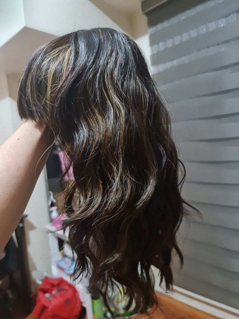 Wig (human hair quality) (Category: Hair Accessories) located in Pasig City. Submitted by 53888 (Listing ID 1209382058, Image 1). Description: brand new with tag and packaging brand:Entranced Styles shoulder length wavy brown with blonde highlights.