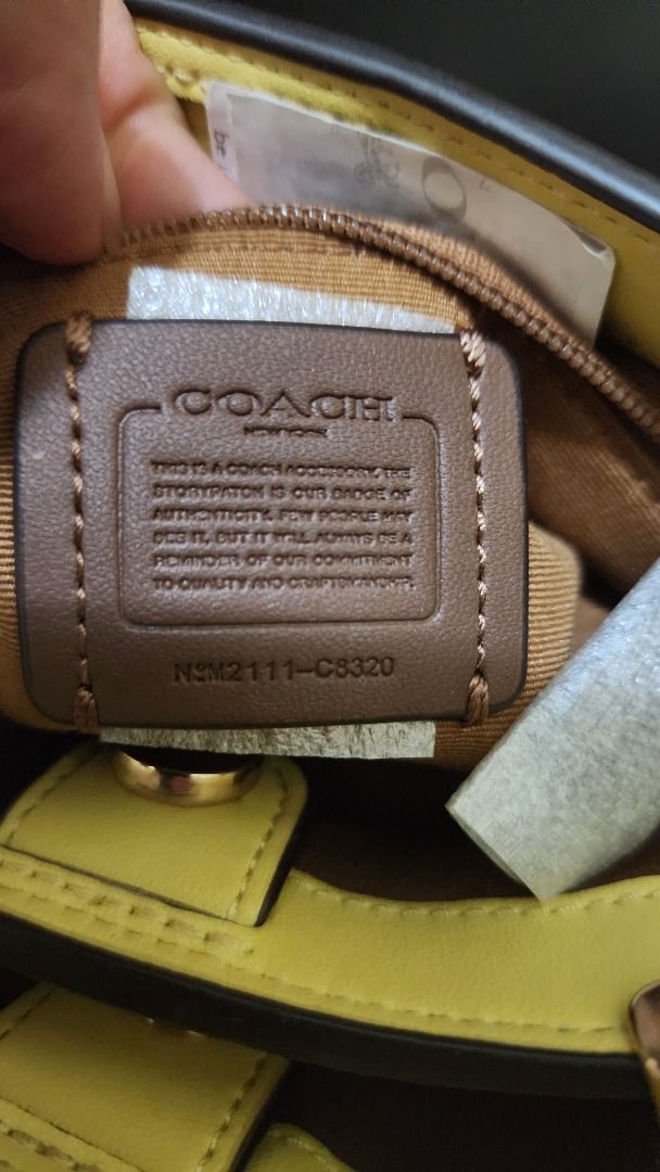 100% Authentic Coach Mini Lane Yellow (Category: Luxury Bags & Wallets) located in Manila. Submitted by sugarlover (Listing ID 1191499306, Image 2). Description: 100% authentic with gift receipt. Like new excellent condition. Money back guarantee if proven fake. Used once NO ISSUES PM for photos Inclusion: Gift receipt and care card only. This is an outlet bag, no dustbag and box in outlet Rfs need funds.