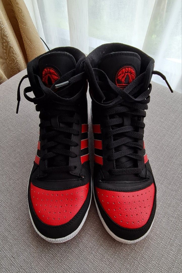 All red adidas high tops sales