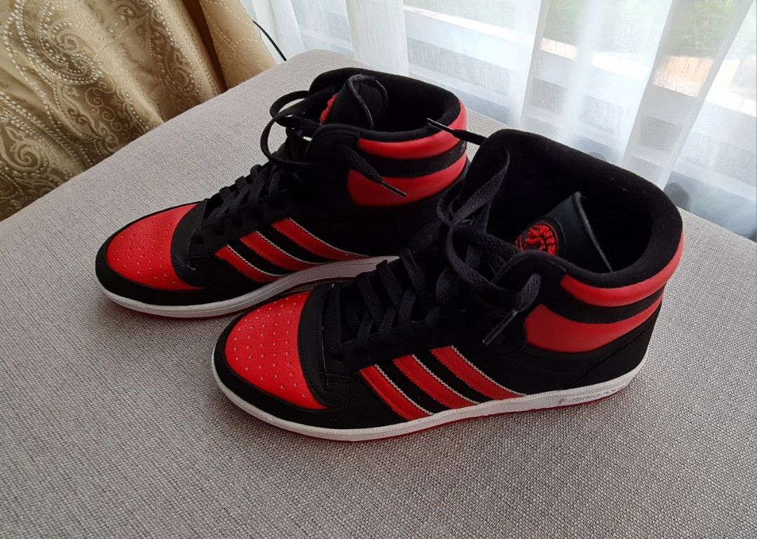 All red sales adidas high tops