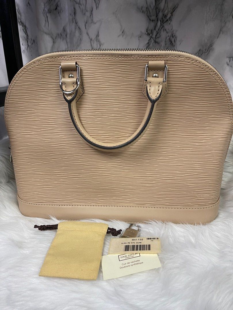 Louis Vuitton Nude Dune Epi Leather Alma PM Bag, Luxury, Bags & Wallets on  Carousell