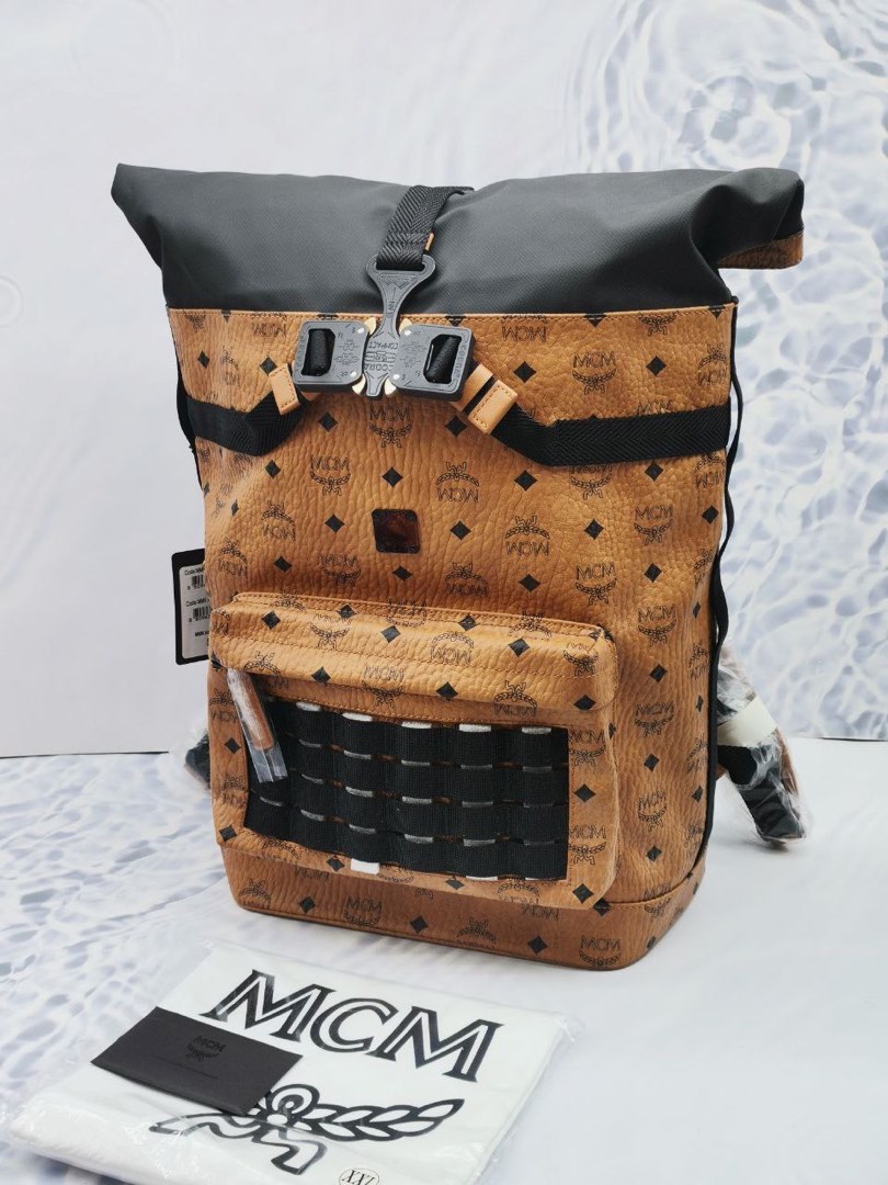 MCM 1976 ROLL TOP BACKPACK IN VISETOS