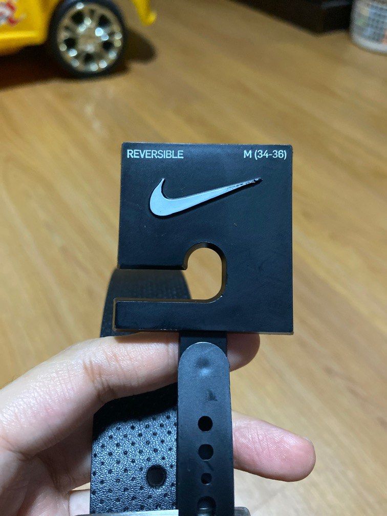 Nike Perforated reversible belt (black/brown) (Category: Belts) located in Paranaque City. Submitted by candidacm (Listing ID 1209600298, Image 3). Description: Bought from Canada. Malaki pala kay hubby 😔 you may check the model number indicated for reference..
