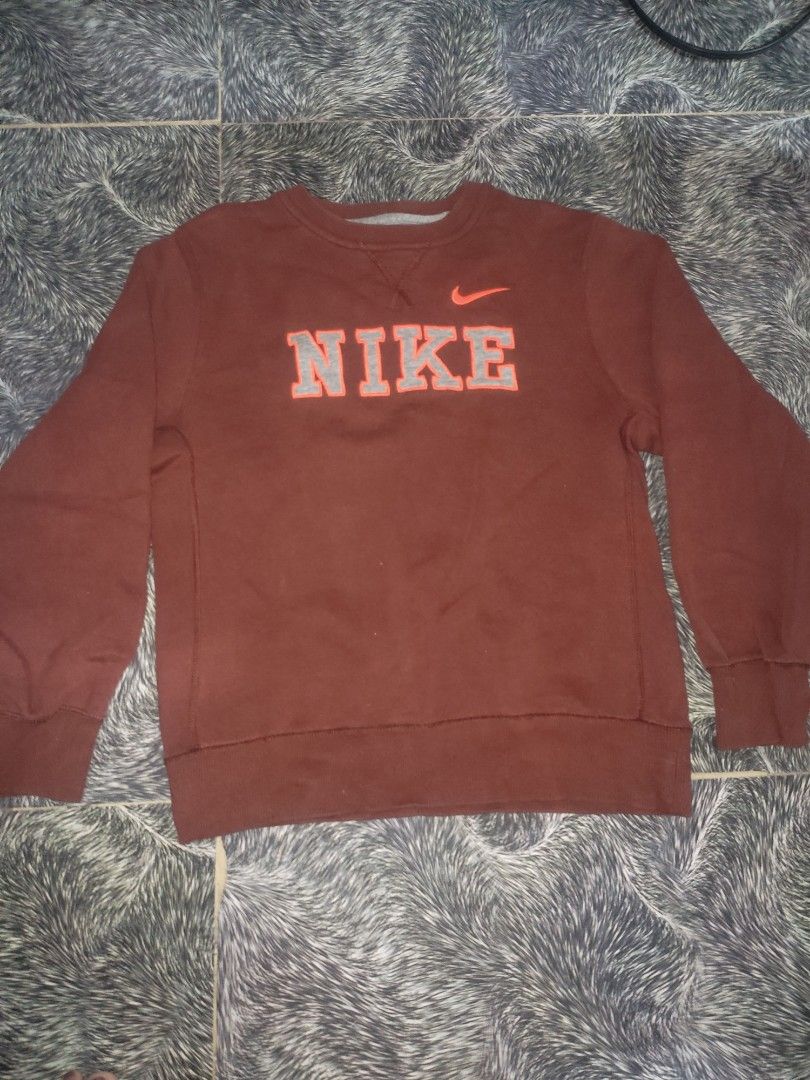rust color nike sweatshirt