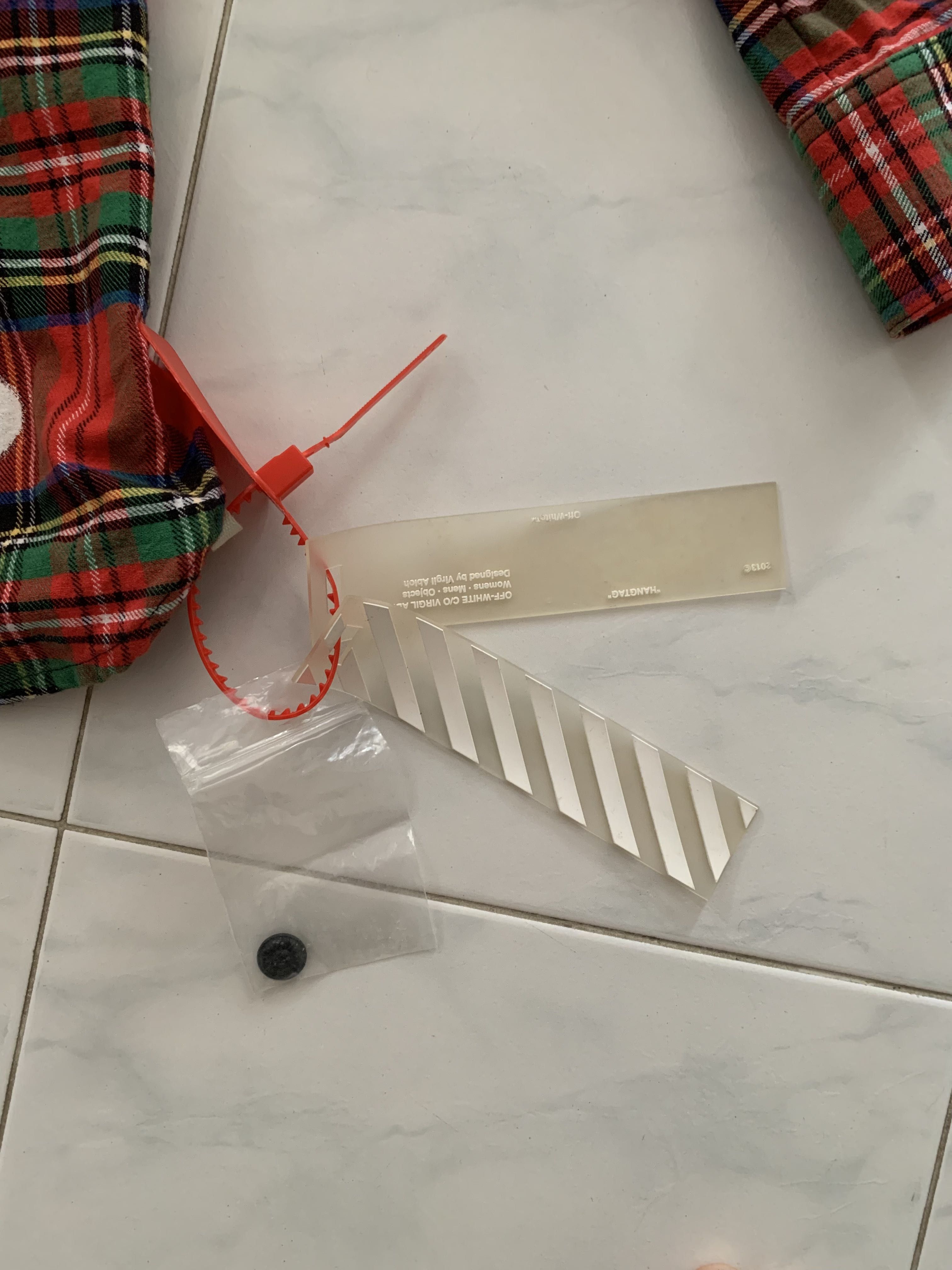 OFF-WHITE (Category: Coats, Jackets and Outerwear) located in Singapore. Submitted by shahnizham (Listing ID 1209538864, Image 4). Description: Used only 3 times and has only been in my wardrobe since. Authentic. See it to believe it or ask a friend that has good eye and know his/her stuff. I do not have the receipt but i bought it from Intruders at Far East. .