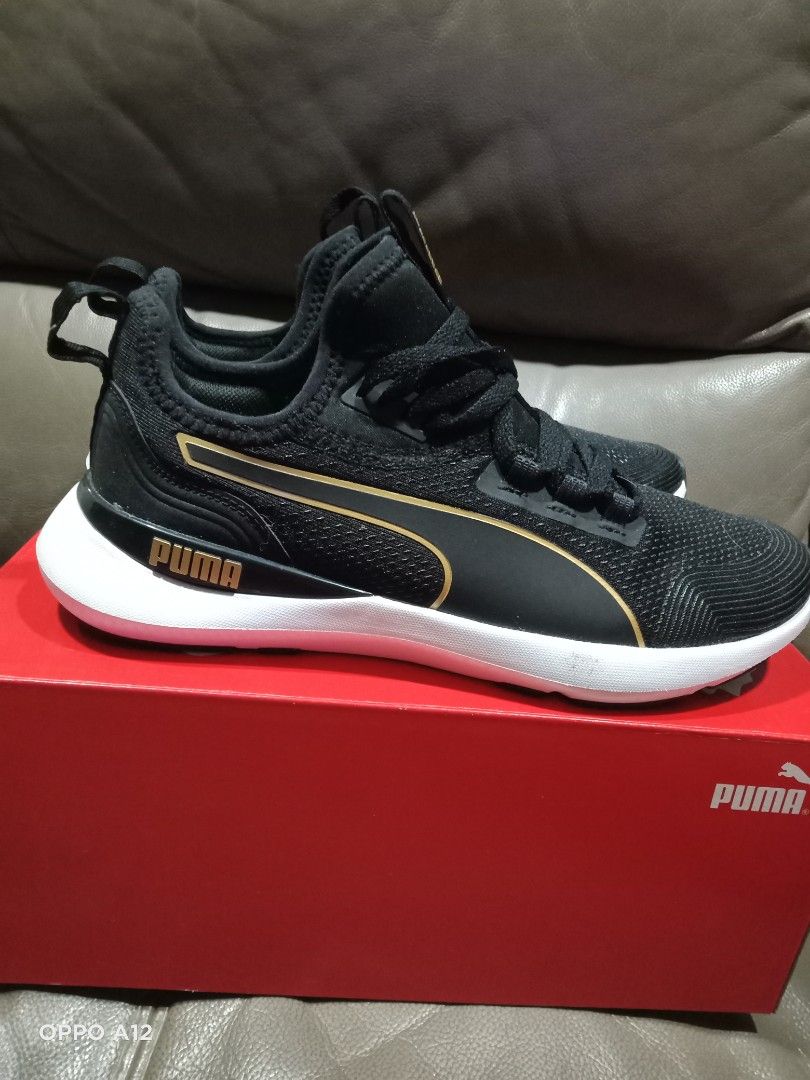 Gold and black puma sneakers on sale